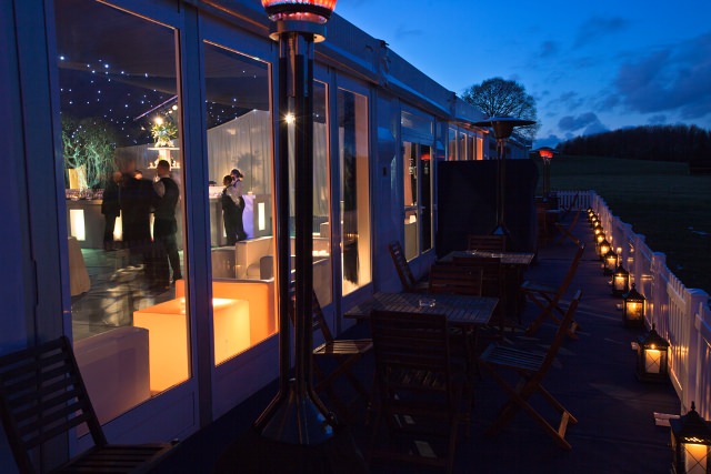 Glass windows onto the marquee terrace