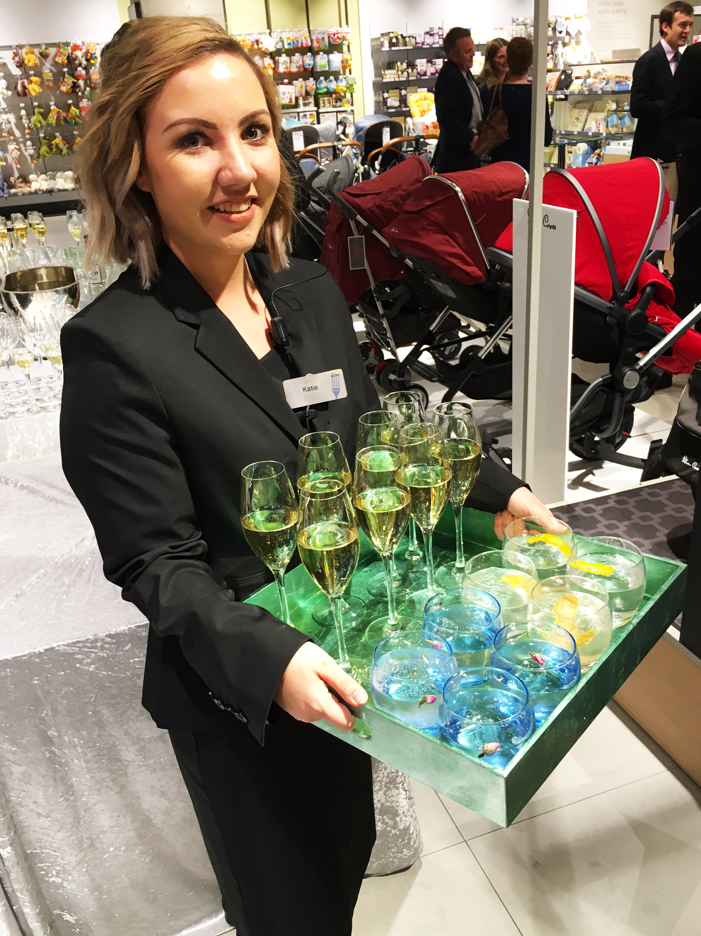 Katie serving drinks in the John Lewis store, Leeds