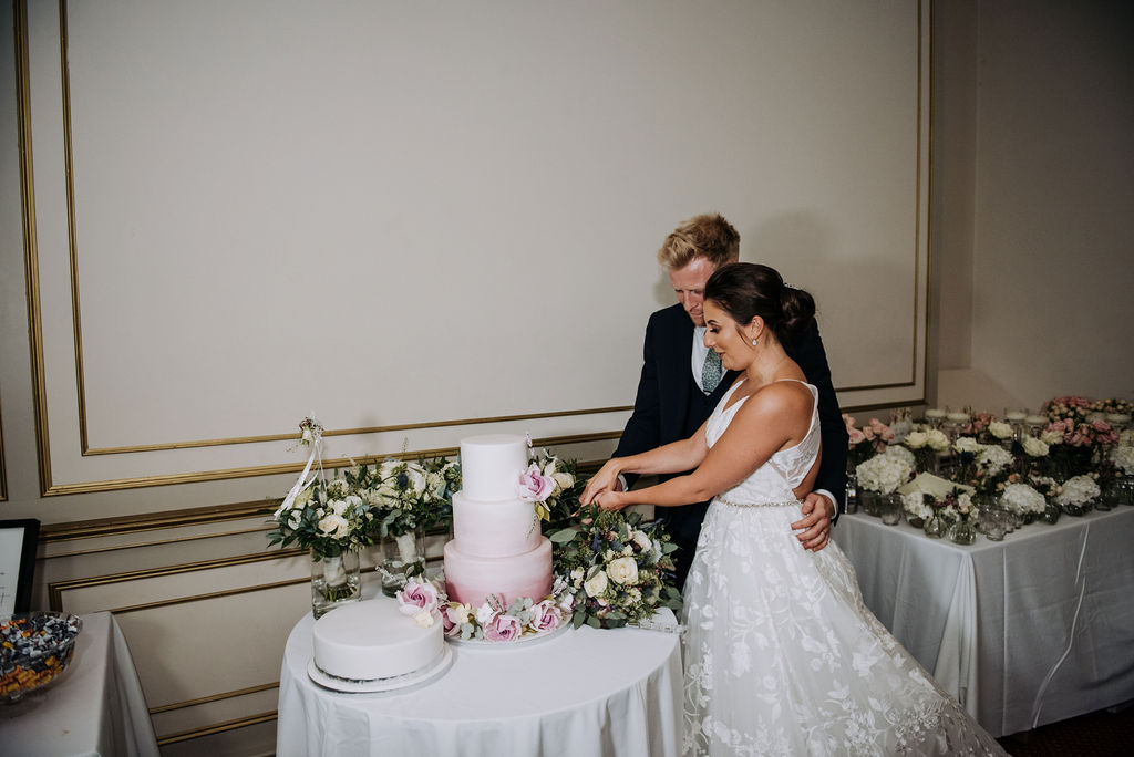 Cutting the cake - Juniper Cakery - Rise Hall Weddings